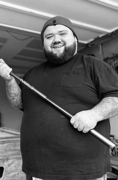 CRBN Cues customer holding his CRBN cue